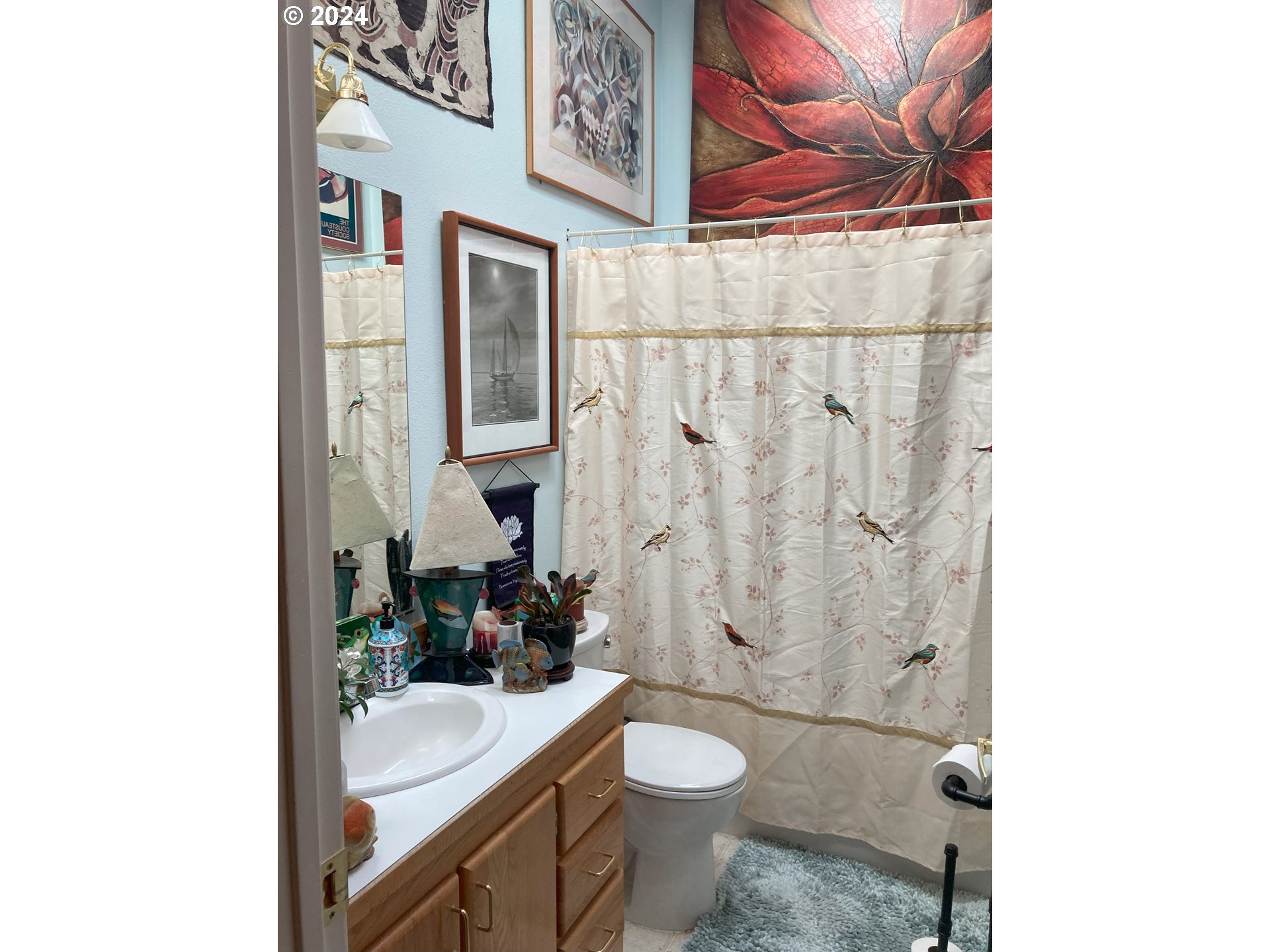 4055 Royal Avenue, Unit 25 Eugene, OR 97402 - Photo 22 of 42 a bathroom with a granite countertop bathtub sink vanity mirror and toilet