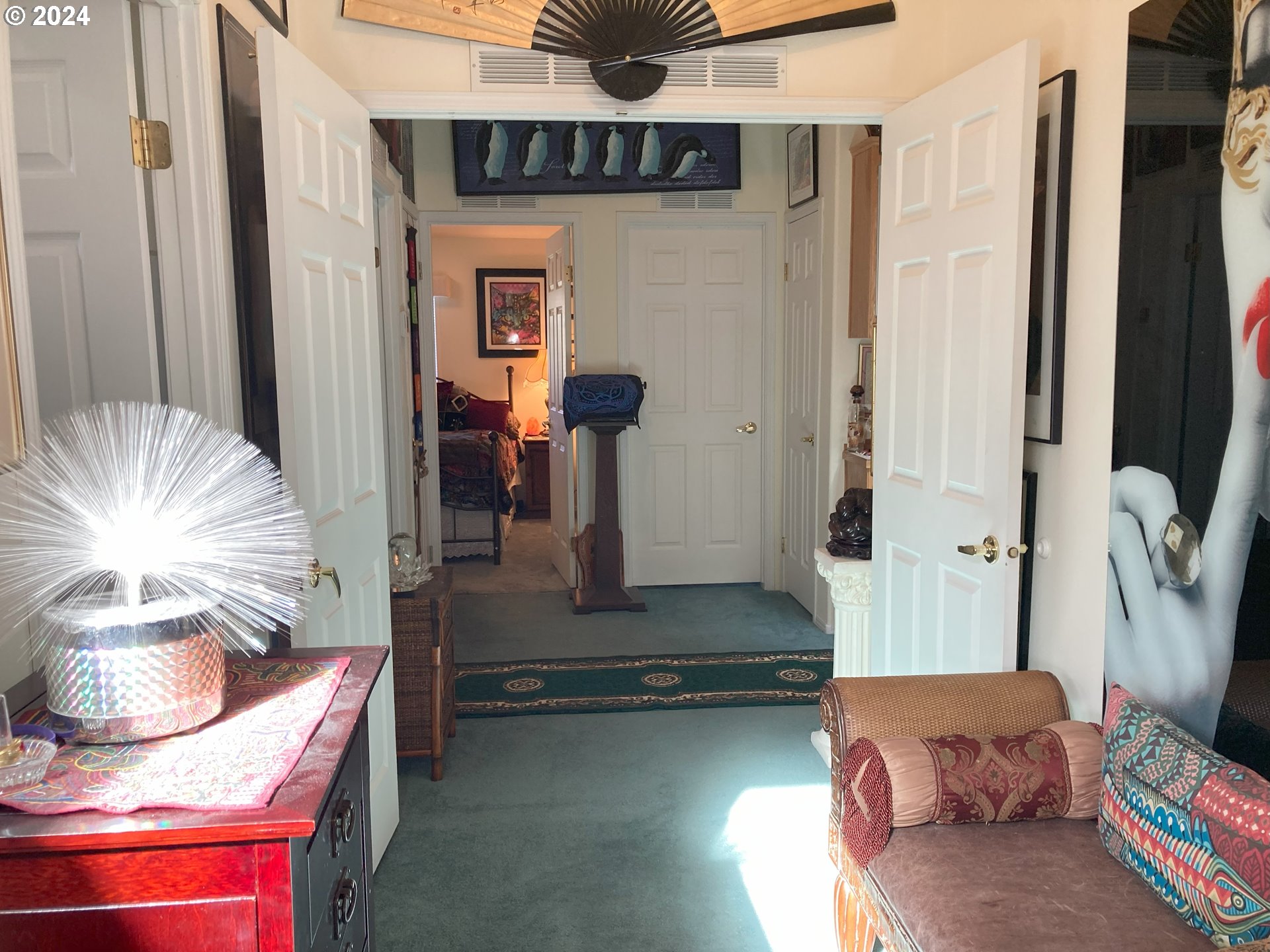 4055 Royal Avenue, Unit 25 Eugene, OR 97402 - Photo 31 of 42 a living room with furniture and a flat screen tv
