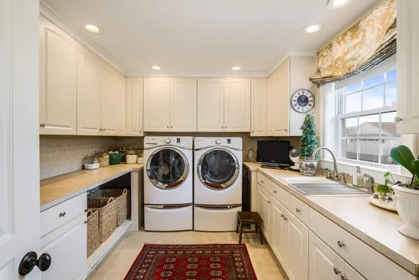 a bedroom with bed and window