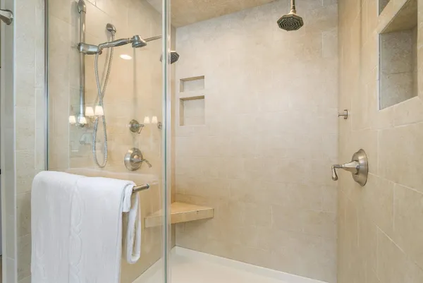 an aerial view of a house with yard