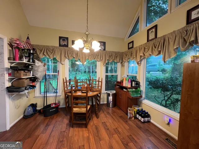 a view of a chairs and table in a patio