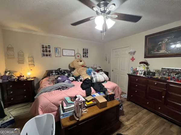 a bathroom with a sink double vanity granite tub shower and a mirror