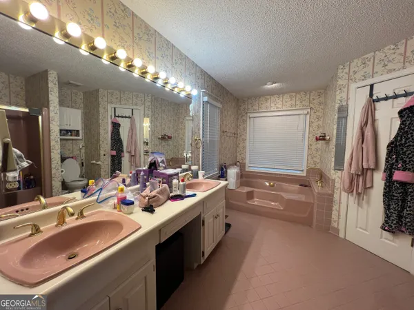 a bathroom with a shower and a toilet