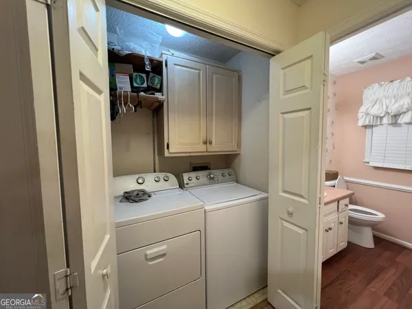 a view of a livingroom from a hallway
