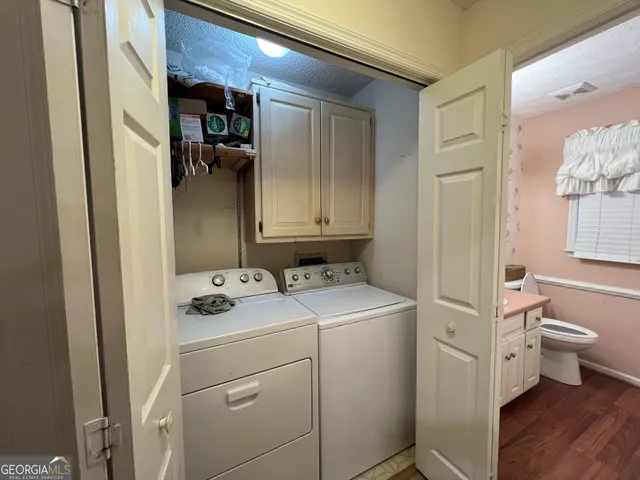 a view of a livingroom from a hallway