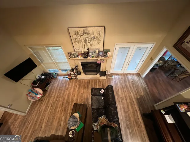 a bed room with a bed and a chandelier