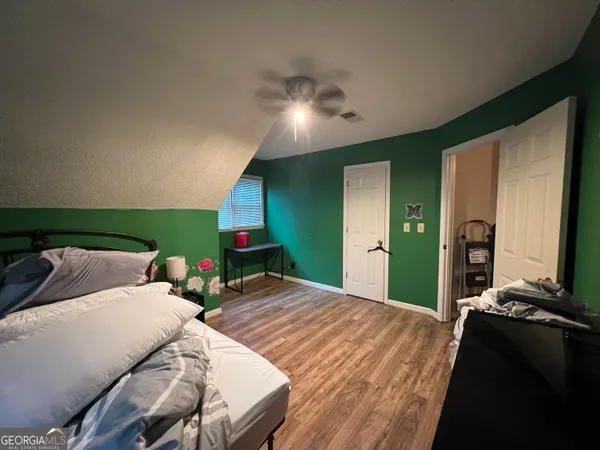 a bathroom with a sink double vanity and a mirror