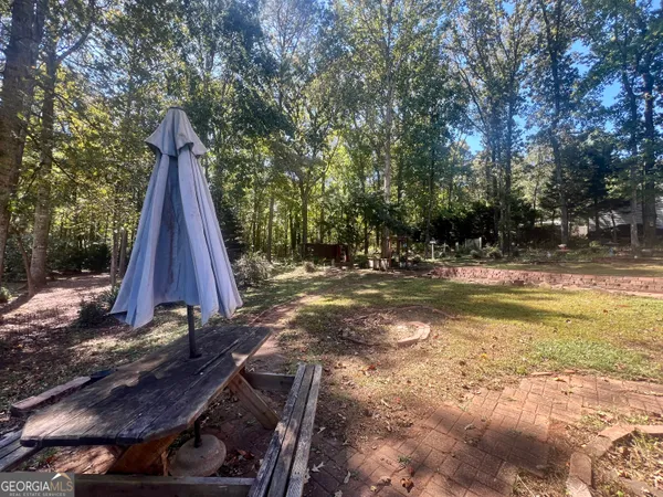 a view of backyard with green space