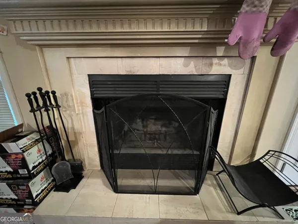 a bed room with a bed and a television