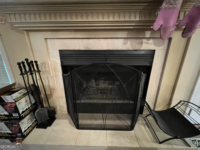 a bed room with a bed and a television