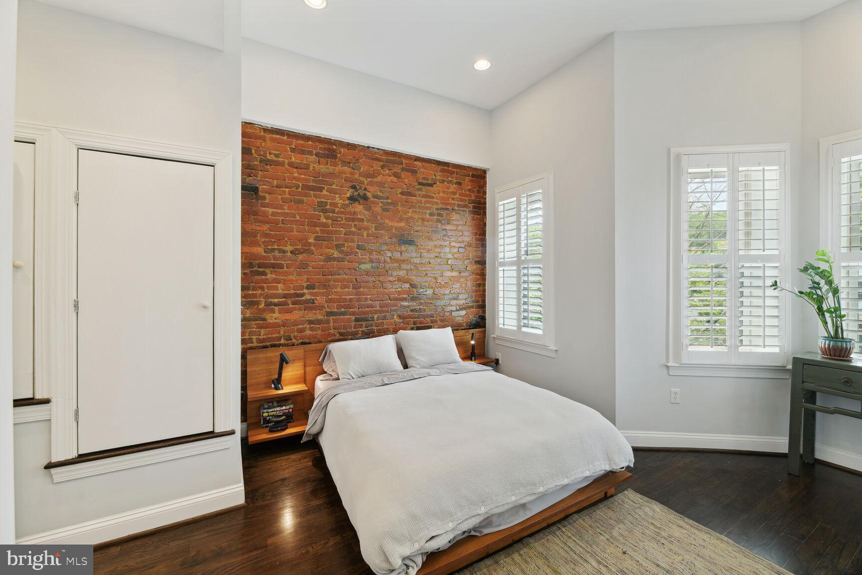 708 E Street Northeast Washington, DC 20002 - Photo 12 of 28 Primary Bedroom with High Ceilings Custom Shutters
