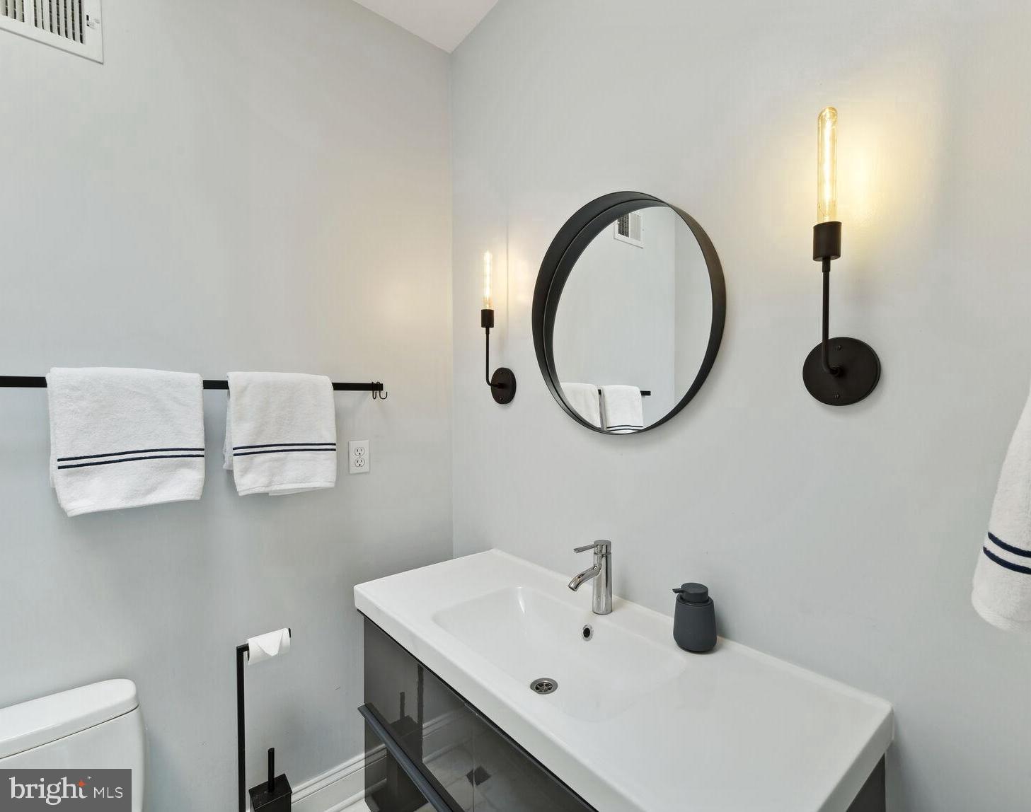 708 E Street Northeast Washington, DC 20002 - Photo 14 of 28 Updated Bath with Multiple Heads and Rain Shower