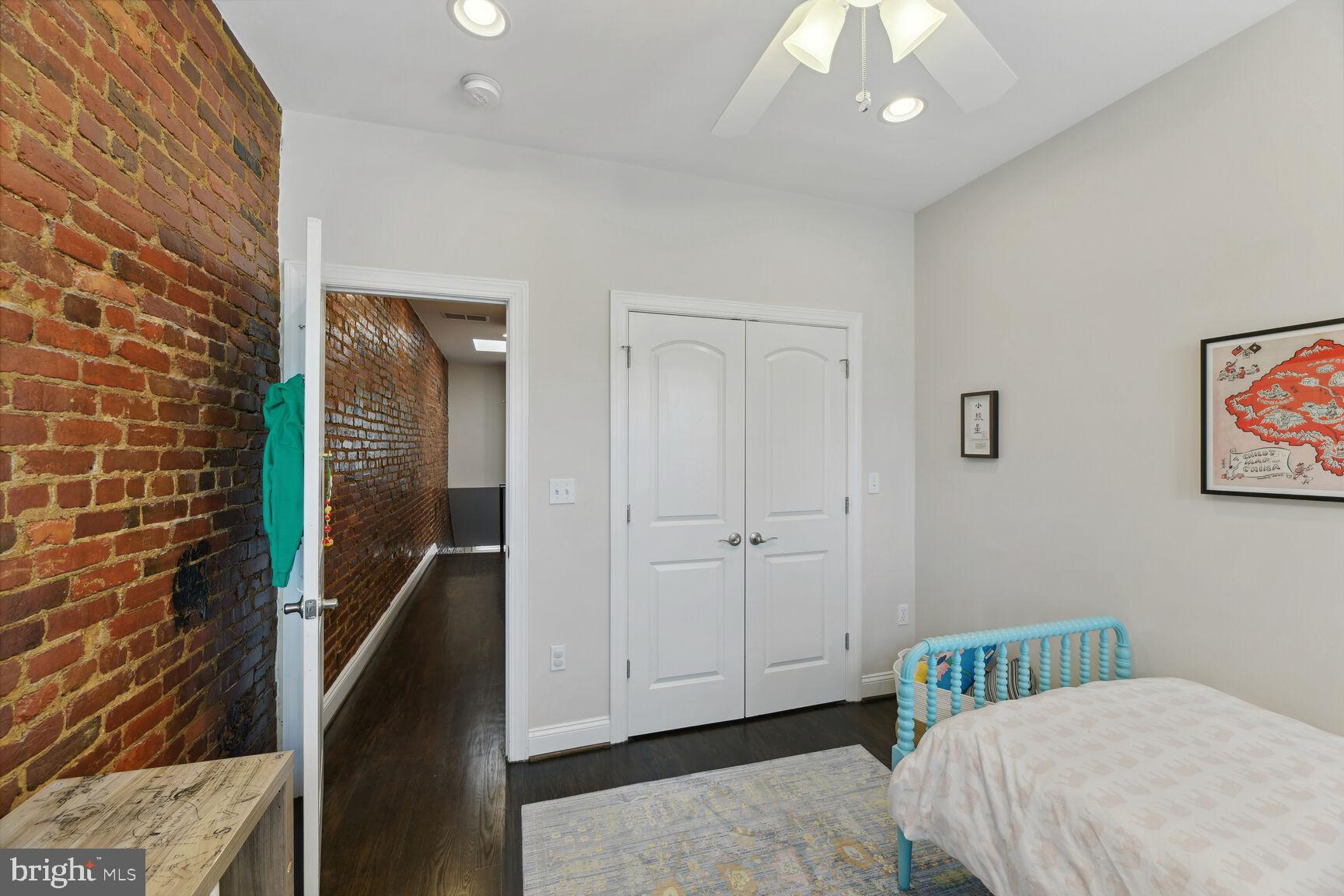 708 E Street Northeast Washington, DC 20002 - Photo 16 of 28 Large Closet, Exposed Brick