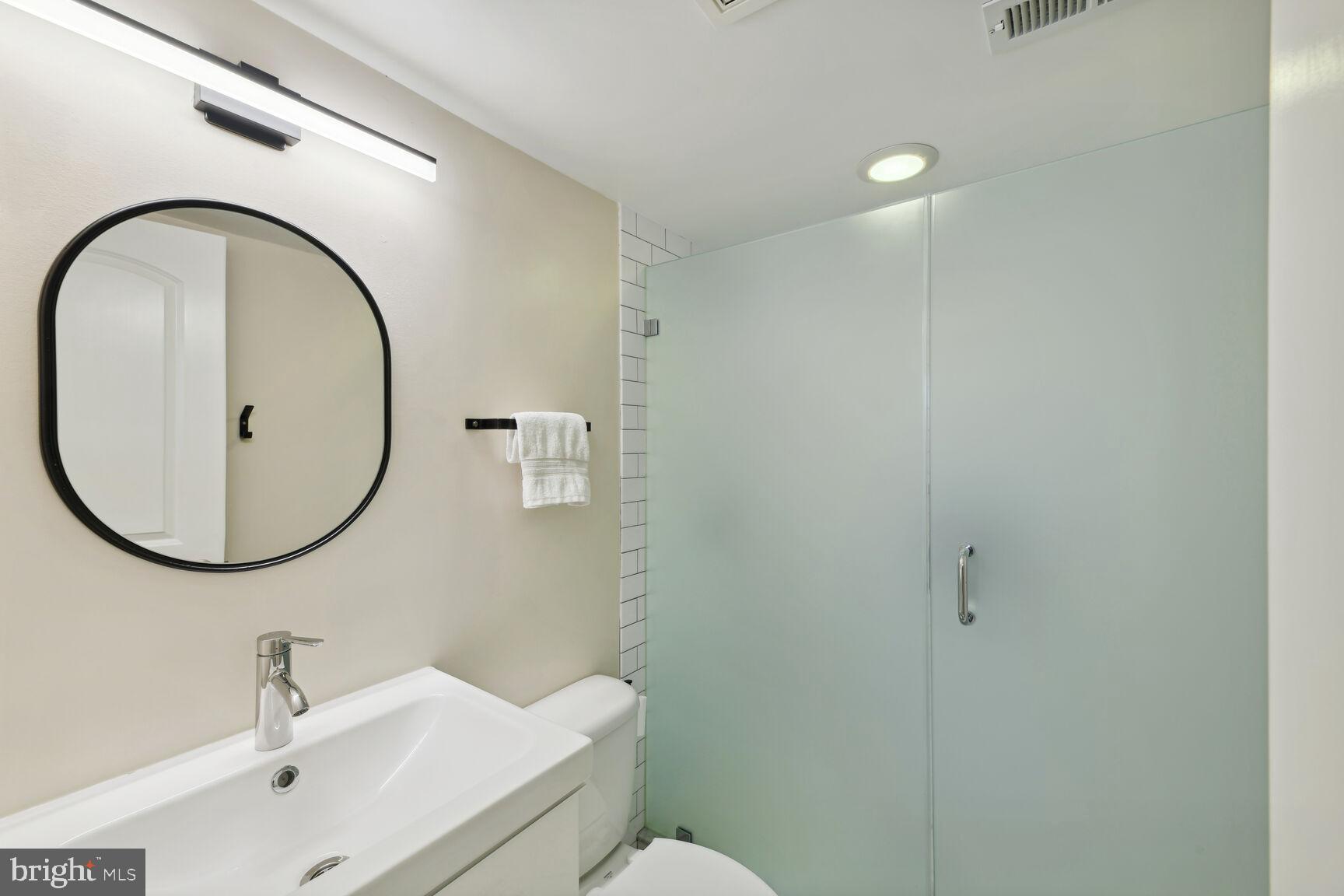 708 E Street Northeast Washington, DC 20002 - Photo 23 of 28 Full Bathroom Number Three with Frameless Glass