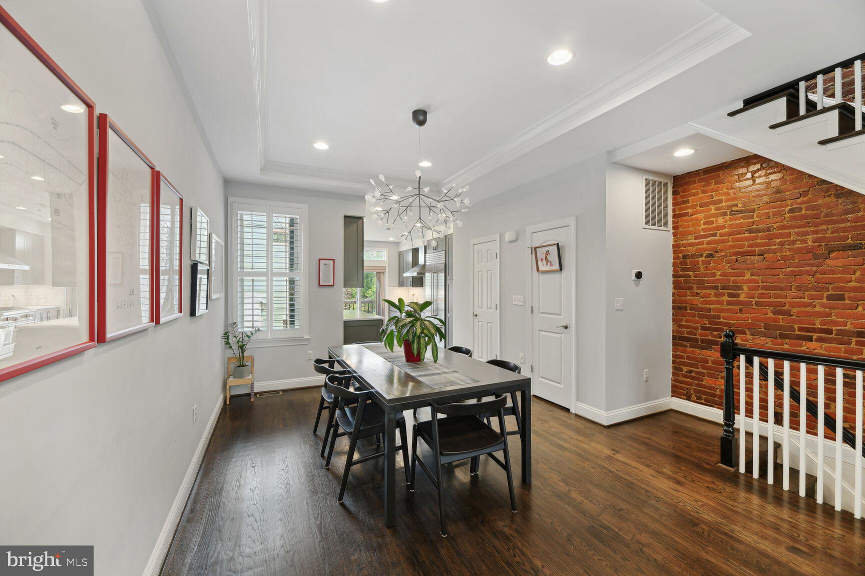 708 E Street Northeast Washington, DC 20002 - Photo 5 of 28 Exposed Brick Walls Add Character to Dining Room
