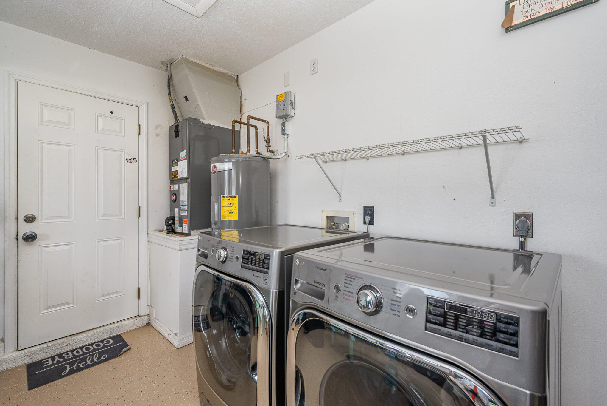 1140 Commerce Road Southeast Palm Bay, FL 32909 - Photo 20 of 24 a utility room with dryer and washer