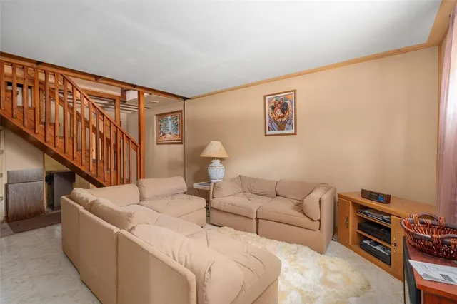 a bedroom with a bed and a lamp