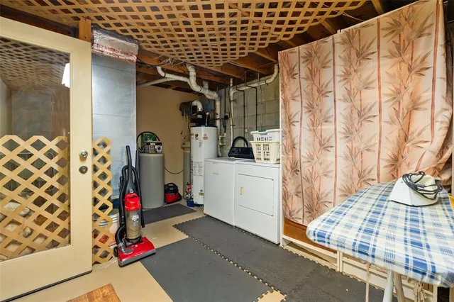 a bedroom with a bed and a table