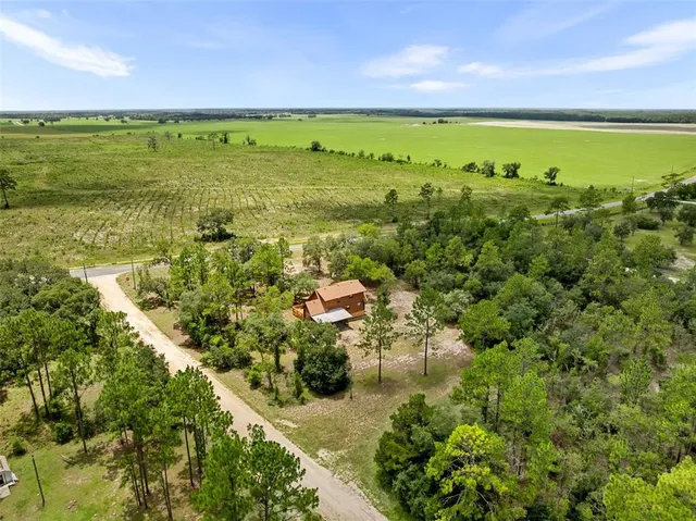 a view of an ocean and a houses