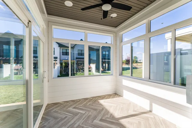 a bathroom with a glass shower door