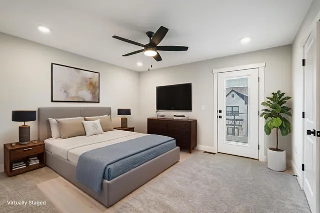 a bedroom with a bed and a walk in closet