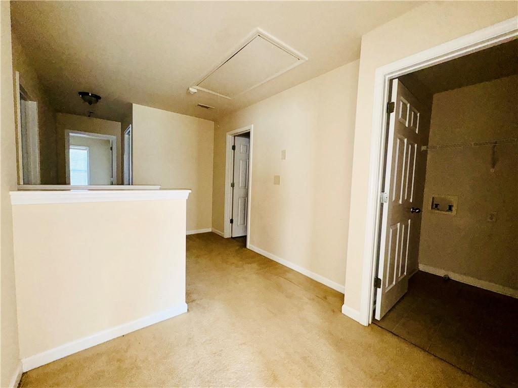 164 Thorncrest Court Tucker, GA 30084 - Photo 12 of 26 an entryway at a room with a hallway