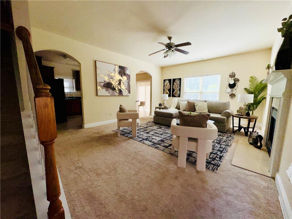 164 Thorncrest Court Tucker, GA 30084 - Photo 20 of 26 a living room with furniture and a flat screen tv