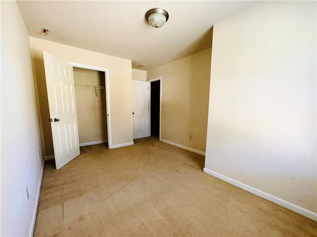 164 Thorncrest Court Tucker, GA 30084 - Photo 23 of 26 a view of a livingroom with a staircase