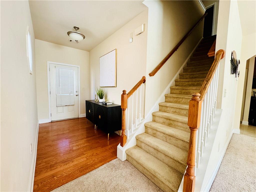 164 Thorncrest Court Tucker, GA 30084 - Photo 5 of 26 a view of entryway and hall with wooden floor