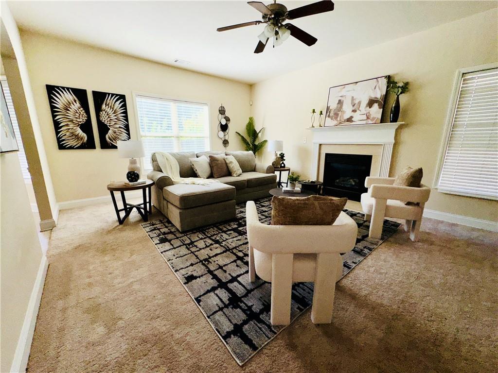 164 Thorncrest Court Tucker, GA 30084 - Photo 7 of 26 a living room with furniture and a fireplace