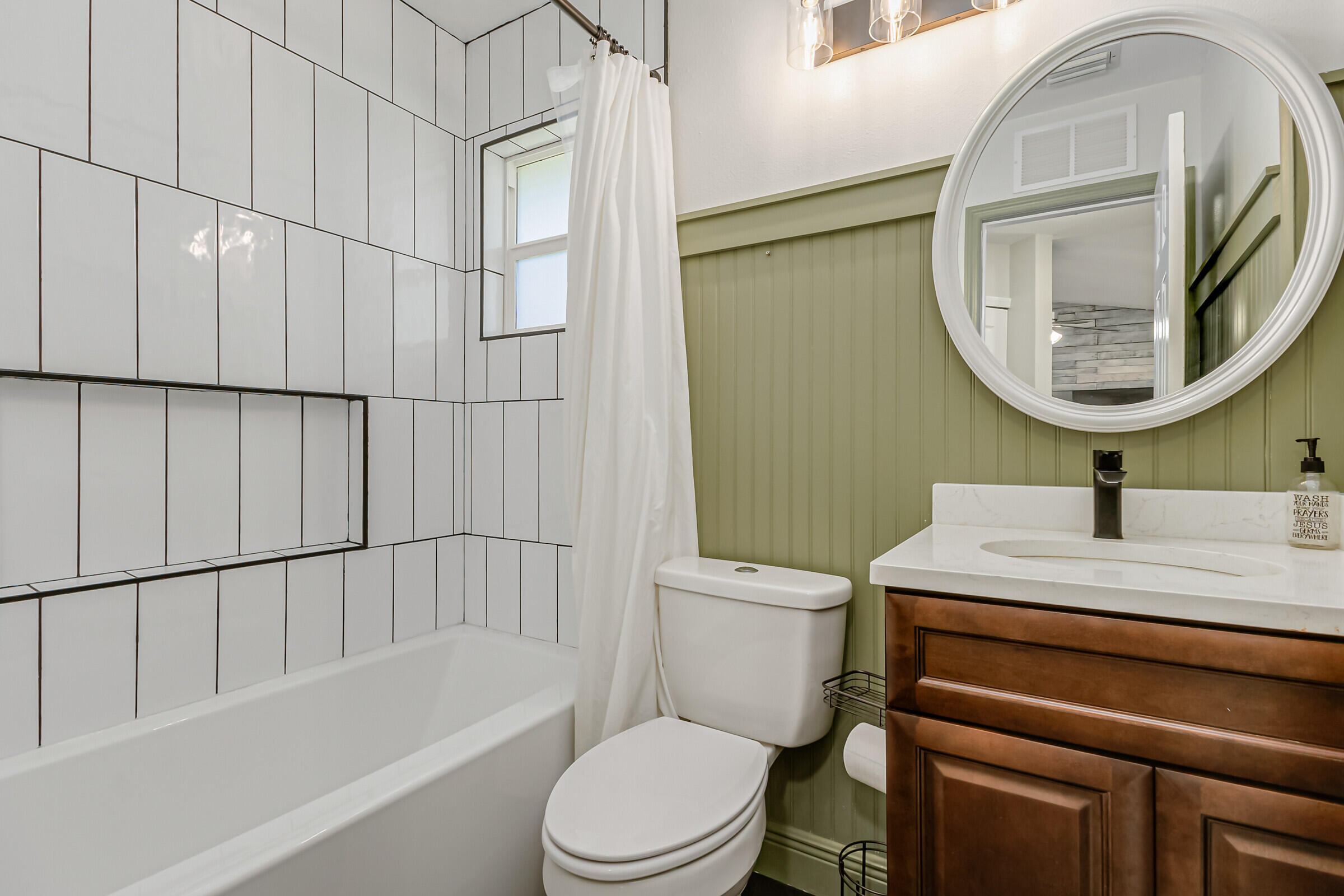 1030 San Rafael Road Southwest Palm Bay, FL 32908 - Photo 21 of 37 a bathroom with a sink toilet and shower