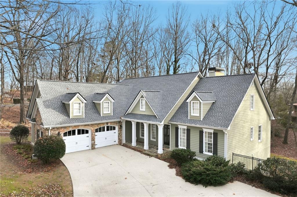 1038 Farmhouse Road Gainesville, GA 30506 - Photo 11 of 51 a view of a white house with a yard