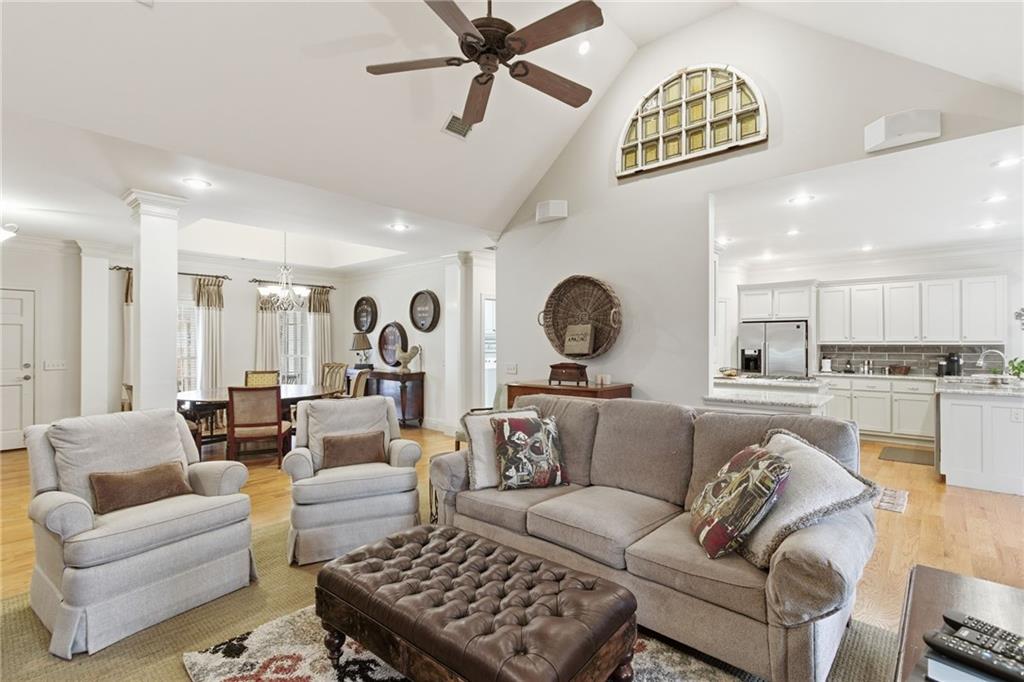 1038 Farmhouse Road Gainesville, GA 30506 - Photo 21 of 51 a living room with furniture kitchen view and a window