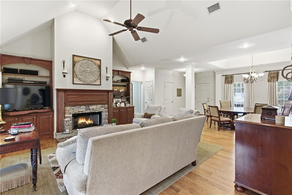 1038 Farmhouse Road Gainesville, GA 30506 - Photo 22 of 51 a living room with furniture and a fireplace