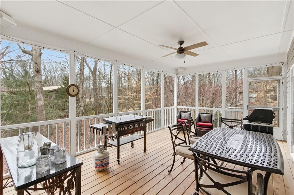 1038 Farmhouse Road Gainesville, GA 30506 - Photo 37 of 51 a view of a dining room with furniture window and outside view
