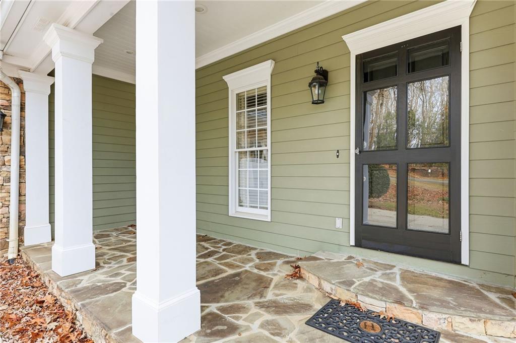 1038 Farmhouse Road Gainesville, GA 30506 - Photo 4 of 51 a front view of a house