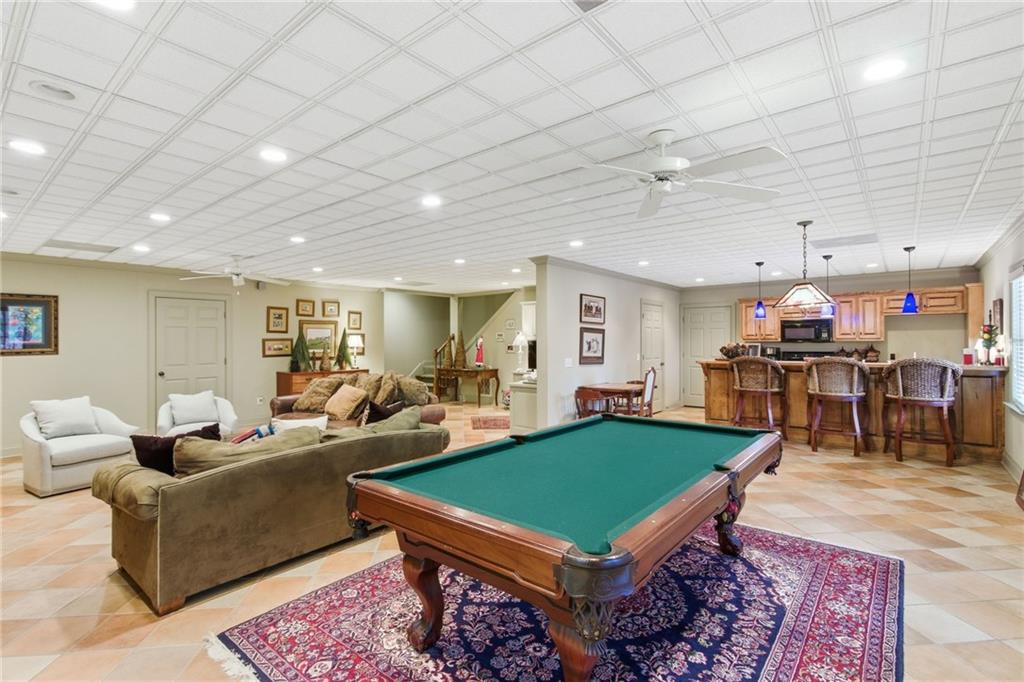 1038 Farmhouse Road Gainesville, GA 30506 - Photo 44 of 51 a living room with furniture a pool table and a table