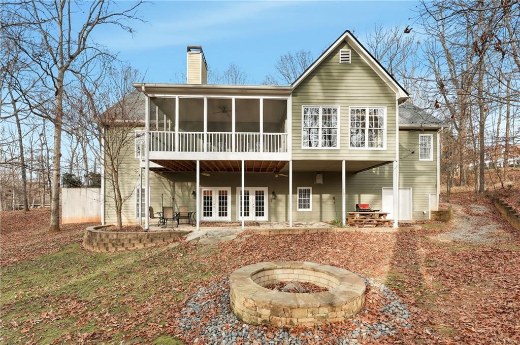 1038 Farmhouse Road Gainesville, GA 30506 - Photo 7 of 51 front view of a house with a yard