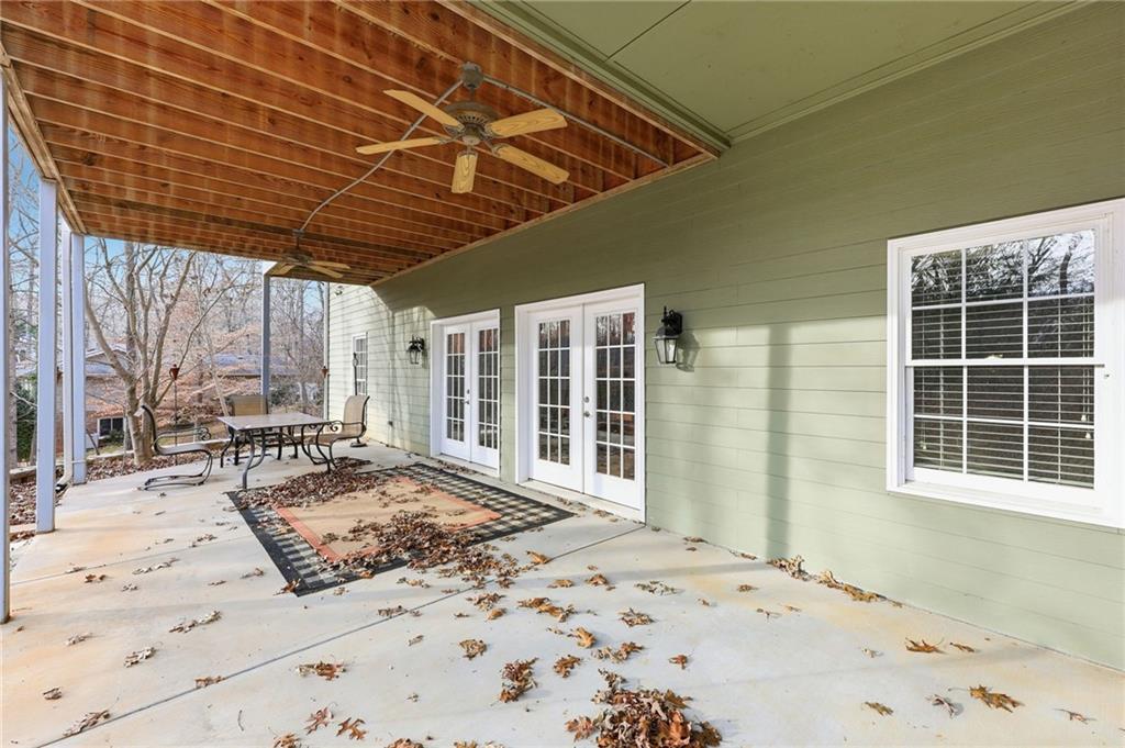 1038 Farmhouse Road Gainesville, GA 30506 - Photo 9 of 51 a view of a backyard with a patio