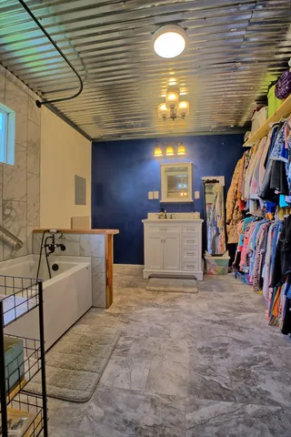 a view of a workspace with furniture