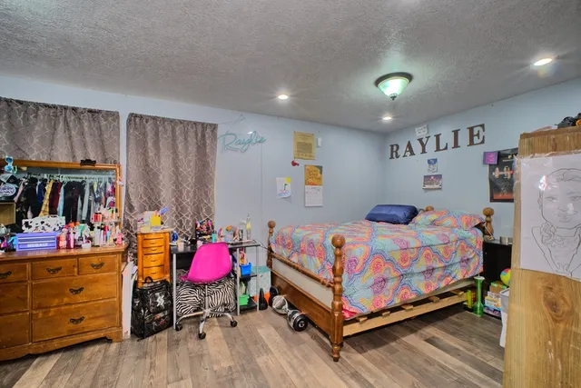 a view of a room with furniture and toys
