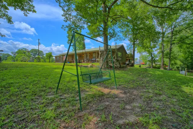 a view of a house with a park