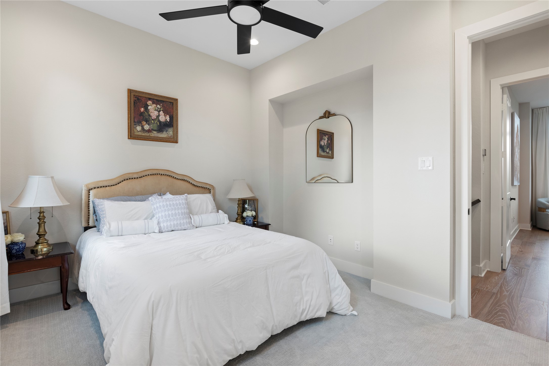 1410 Milby Street, Unit C Houston, TX 77003 - Photo 19 of 28 a bedroom with a bed and a lamp on table