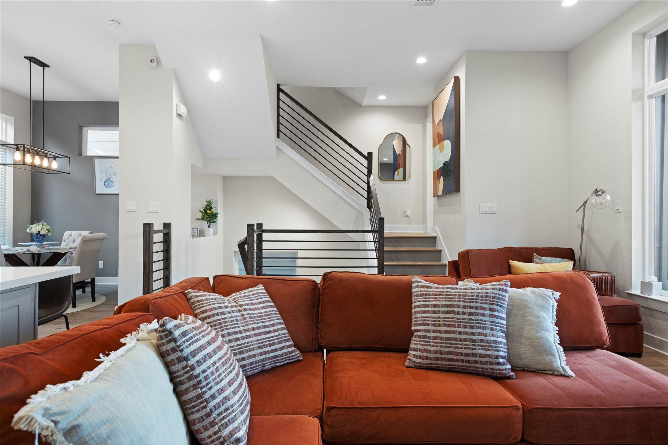 1410 Milby Street, Unit C Houston, TX 77003 - Photo 3 of 28 a bedroom with furniture and a view of kitchen