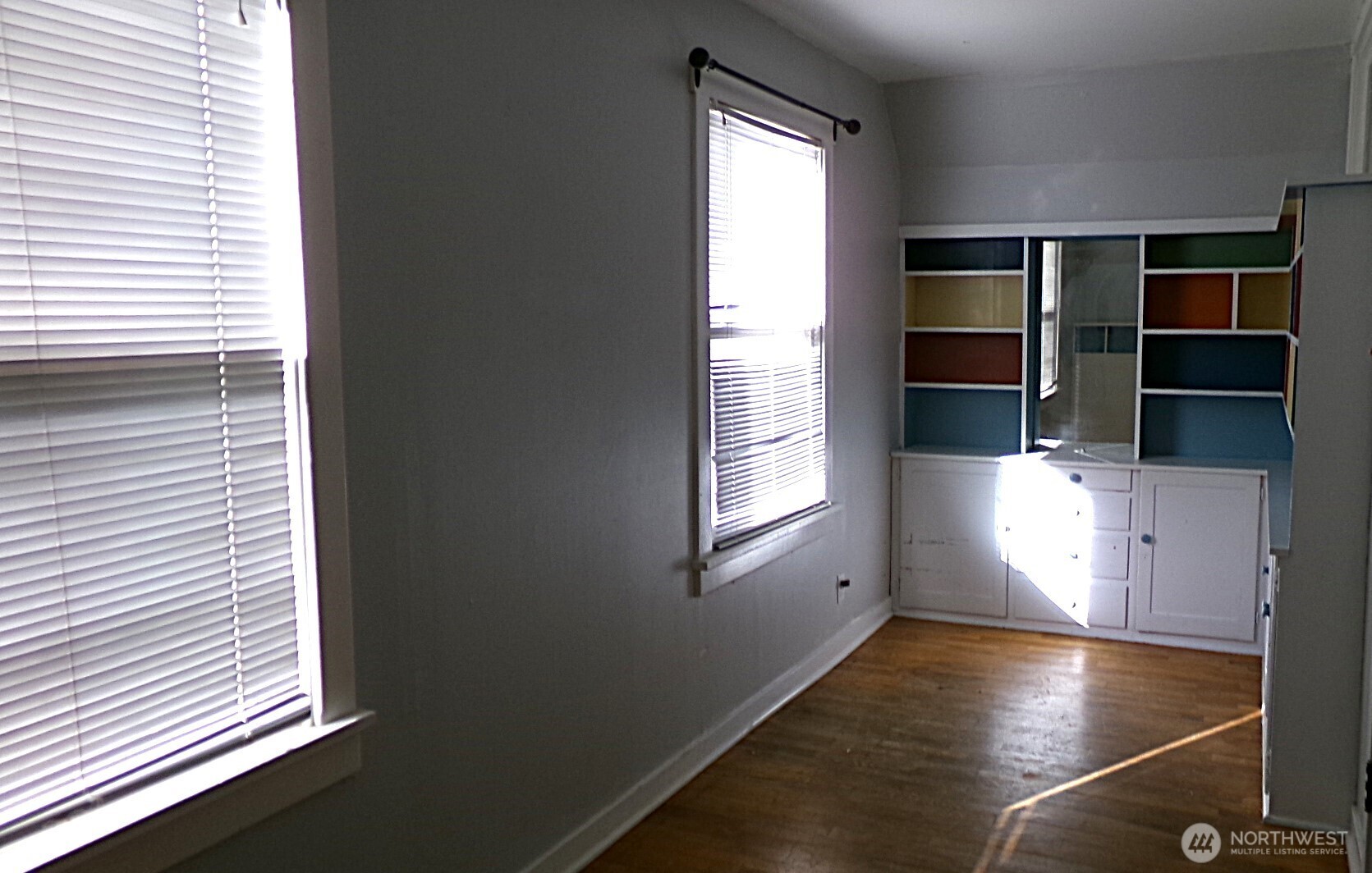 1555 Swartout Road Manson, WA 98831 - Photo 23 of 40 wooden floor in an empty room with a window