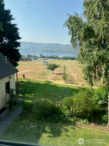 a view of a lake with a big yard