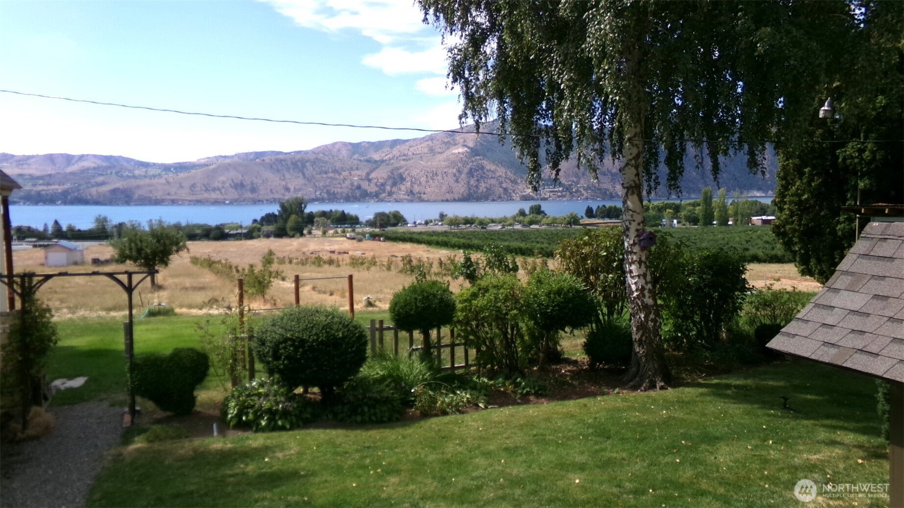 1555 Swartout Road Manson, WA 98831 - Photo 3 of 40 a view of swimming pool and lake view