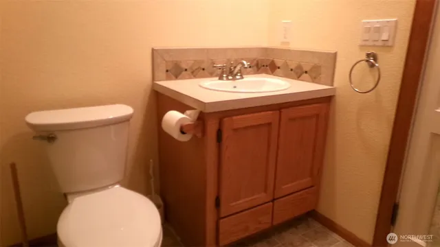 a bathroom with a sink and a toilet