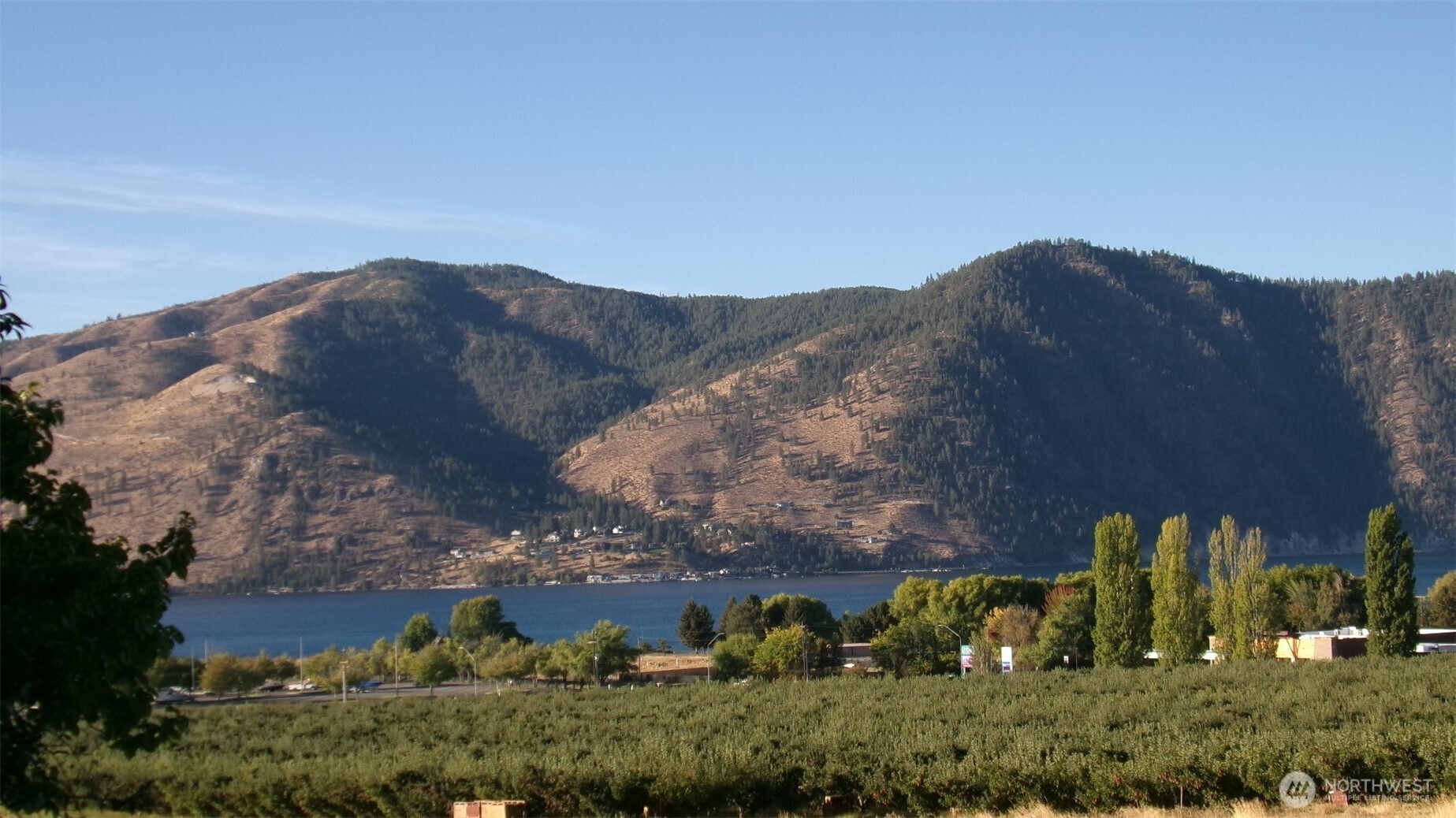 1555 Swartout Road Manson, WA 98831 - Photo 6 of 40 an aerial view of a house