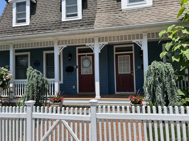a front view of a house with a porch